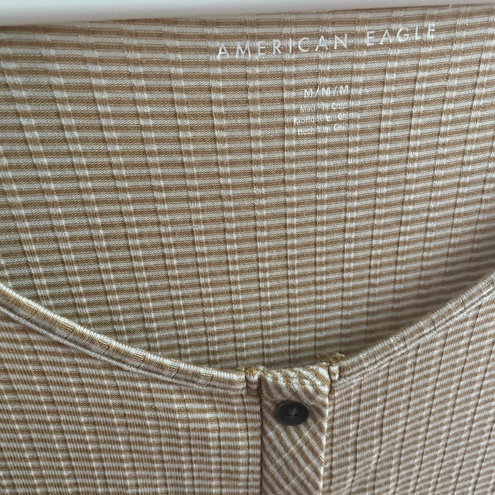 American eagle yellow stripped shirt. Never worn